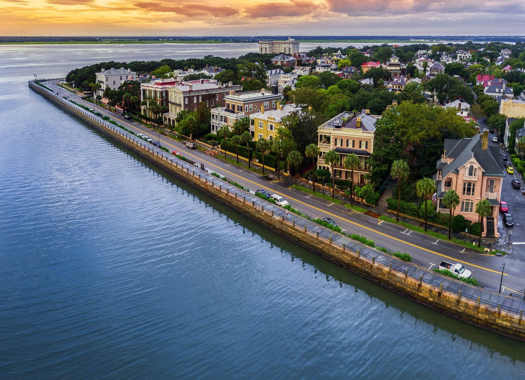 Aerial view of the Battery and Murray Boulevard on the Charleston peninsula at golden hour