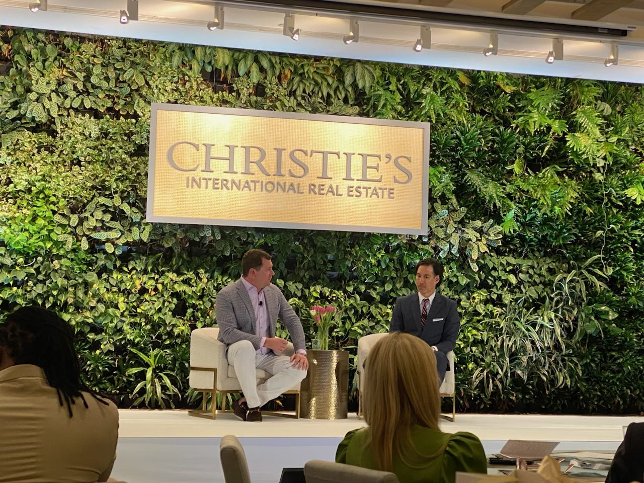 Damian Hall in conversation on stage at the Christie's International Real Estate summit